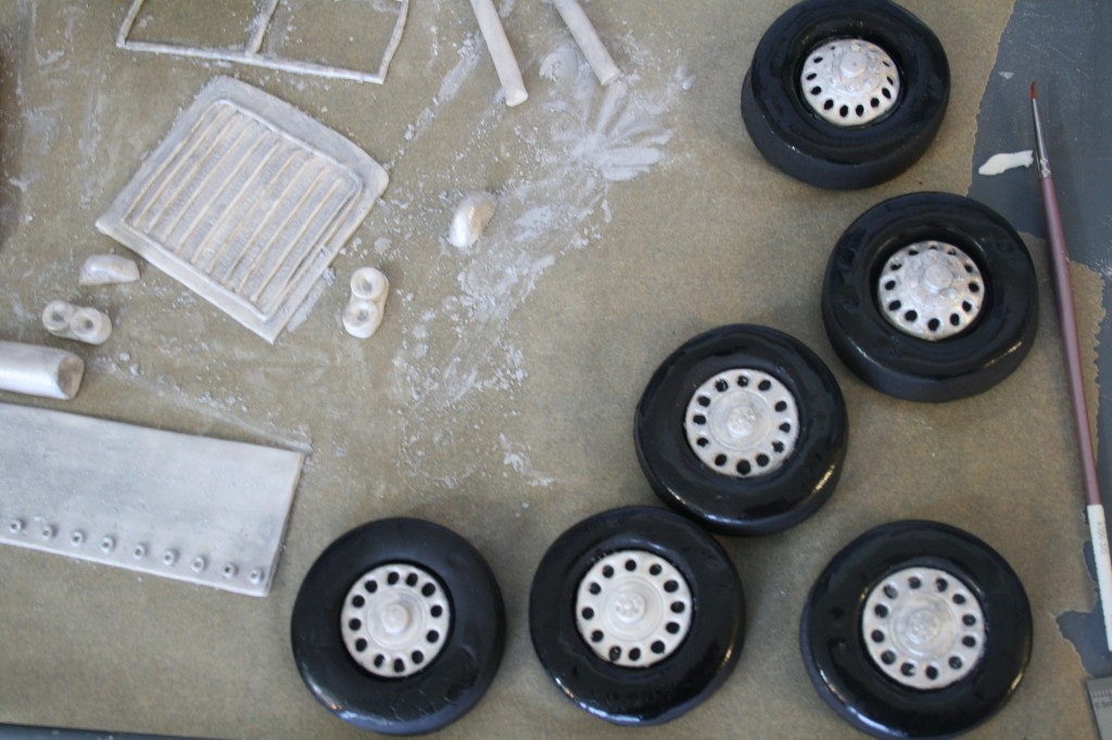 Pieces painted with luster dust and tires assembled